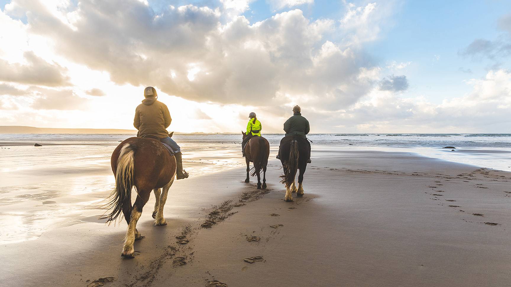 3 Reiter am Strand